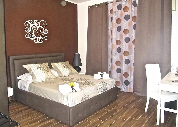 Symposium 4* Κατάνια